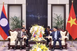 越南国家主席梁强会见老挝总书记、国家主席通伦·西苏里。图自越通社