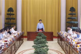 越南国家主席梁强对国家主席办公厅工作任务做出指导。图自越通社
