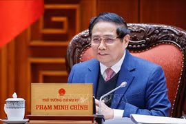 政府总理范明政。图自越通社