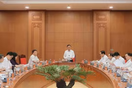 会议场景。图自越通社