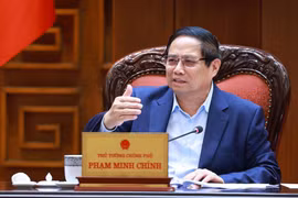 政府总理范明政发表讲话。图自越通社