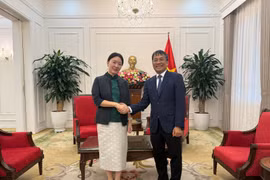 越南外交部常务副部长阮明宇会见中国广西壮族自治区副主席卢新宁。