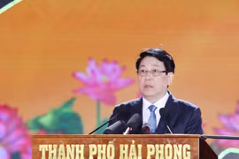 国家主席梁强发表讲话。图自越通社