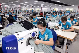 越南纺织服装业贸易顺差达近70亿美元。图自越通社