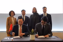 越南财政部与摩根大通银行签署了《合作备忘录》。图自越通社