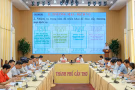 会议场景。图自越通社