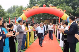 越共中央书记处常务书记陈锦秀莅临老街省出席民族大团结日活动。图自越通社