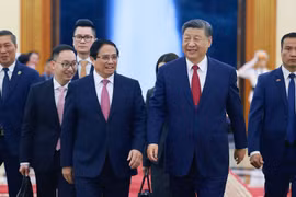 越南政府总理范明政会见中共中央总书记、中国国家主席习近平