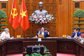 越南政府总理范明政发表讲话。图自越通社