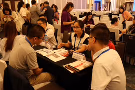 近20家中国重庆企业来河内寻求合作机会。图自thoibaonganhang.vn
