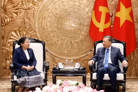 越共中央总书记、国家主席苏林会见老挝人民革命党中央组织部部长西赛。图自越通社