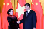 阮氏金银主席会见中共中央总书记、国家主席习近平