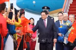 越南政府总理范明政抵达北京开始对中国进行正式访问并出席世界经济论坛年会