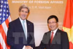 附图：2013年越南政府副总理兼外交部长范平明会见访越的美国国务卿约翰·克里（图片来源：越通社）