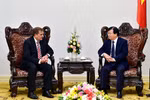 越南政府副总理郑廷勇会见美国艾克森美孚集团副董事长（图片来源：越南政府门户网站）