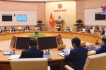 越南政府总理范明政主持召开2月政府例行会议