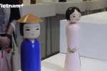 来越南妇女博物馆欣赏穿着越南奥黛和三婆衫的日本人偶