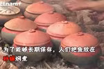 河南省大黄村居民忙碌烹制红烧鱼 为春节提供服务