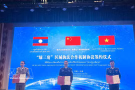 越中老三国代表签署绿三角区域执法合作机制协议。图自越通社