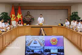 越南政府副总理阮文胜主持召开国际金融中心执行委员会会议。图自越通社