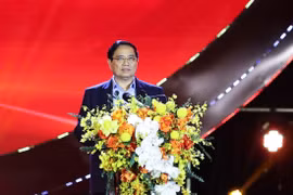 越南政府总理范明政出席“各民族大团结—越南文化遗产周”开幕式。图自越通社
