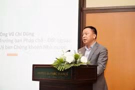 对外法务部主任武志勇发表讲话。图自越通社