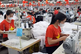 越南纺织品服装出口位居全国前列。图自越通社