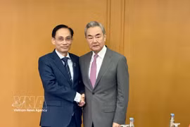 黎怀忠在第59届东盟外长会议期间会见中、加、新三国外长