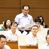 第十六届国会第二次会议：农业与环境部长就防灾减灾和生物技术发展作说明报告。图自越通社