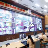 在公安部交通警察局指挥信息中心利用AI摄像头对交通状况进行全天候24小时监控。图自越通社