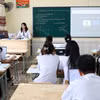 宁平省金榜坊朱文安初中学生的AI应用课时。图自越通社