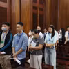 受审的被告人。图自越通社
