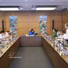 老街省和永隆省代表在分组讨论环节中。图自越通社