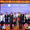 数字技术与人工智能局同农业发展研究院签署合作谅解备忘录。图自越通社