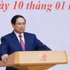 越南政府总理范明政主持召开关于2025年经济外交工作总结暨2026年任务部署的视频会议。图自越通社