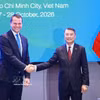 越南政府总理黎明兴会见世界经济论坛执行董事斯特凡·默根特勒。图自越通社