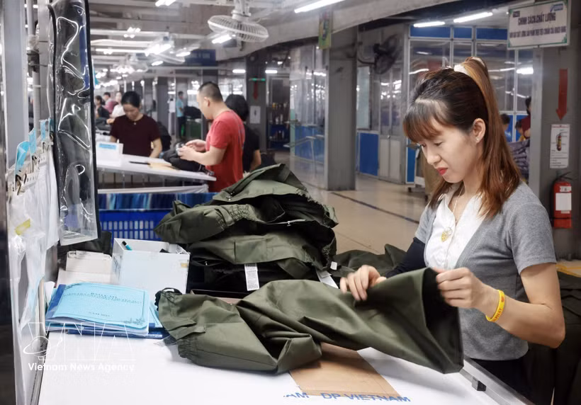 太原省TNG纺织服装股份公司生产出口欧盟市场的产品。图自越通社