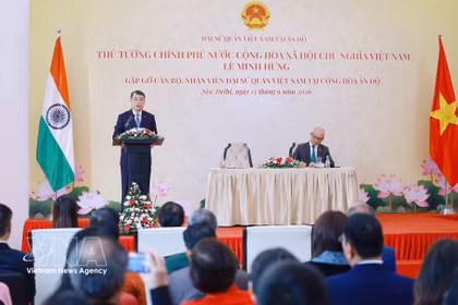 黎明兴总理在会见中发表讲话。图自越通社