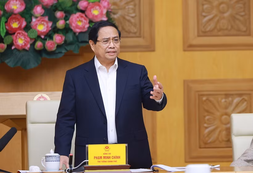 政府总理范明政在会上发言。图自越通社