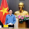 越南政府副总理胡国勇在会议上发表讲话。图自越通社