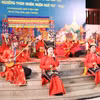 活动上的天曲-天琴表演。图自越通社