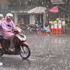 受热带低压影响，全国多地出现强降雨。图自越通社