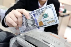 6月20日上午越南国内市场美元价格继续上涨。图自越通社