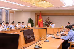 会议场景。图自越通社