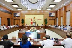 会议场景。图自越通社