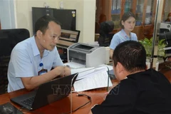 6月30日将举行两级地方政府组织模式正式运行发布会。图自越通社