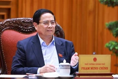 越南政府总理、铁路领域国家重点项目指导委员会主任范明政发表讲话。图自越通社