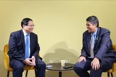 范明政总理会见帕劳总统。图自越通社