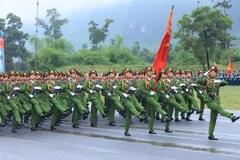 人民公安人员参加庆祝国庆阅兵和游行彩排活动。图自越通社