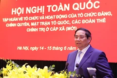 政府副总理范明政发表讲话。图自越通社